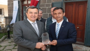 Batur, Romanlara işbirliği protokolü imzaladı